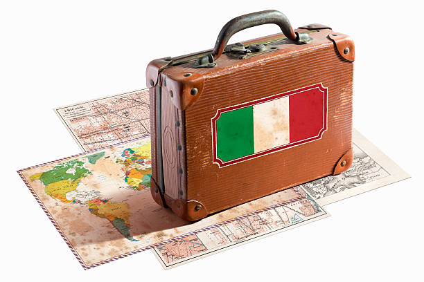 istock Antique leather suitcase with Italy flag on maps 467997581