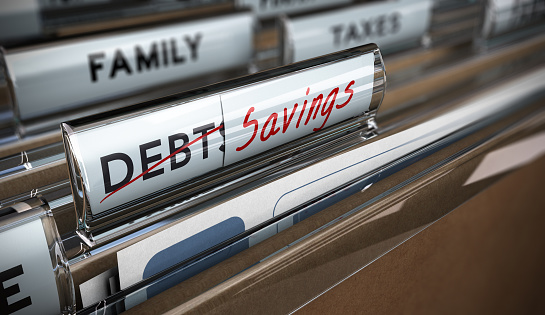 File tab with focus on savings. Conceptual image for illustration of debt vs savings