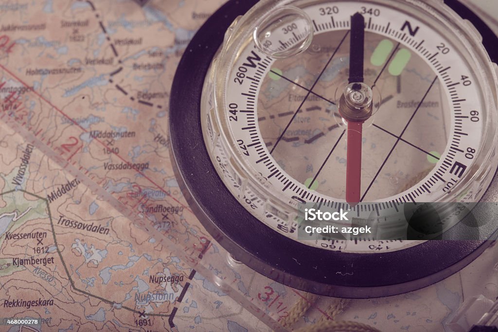 compass retro style abstract shoot with the compass on a map 2015 Stock Photo