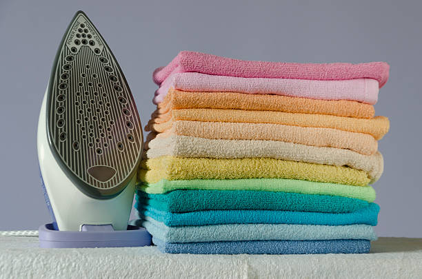 istock Ironing colorful towels 468000356