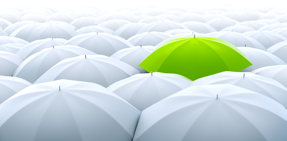 Improved, better and bigger size image of different, leader, best, unique, boss, individuality, original, special, worst, first, chief, champion and discrimination concept. Green umbrella in a row of white ones