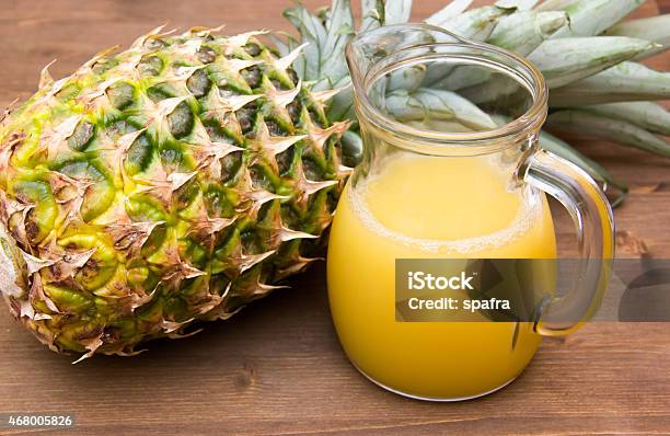 Pineapple Juice On Wood Stock Photo - Download Image Now - 2015, Bowl, Close To