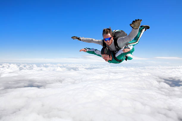 Tandem skydiving stock photo