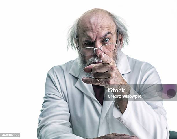 Angry Scientist With Wild Hair Pointing Finger At Camera Stock Photo - Download Image Now