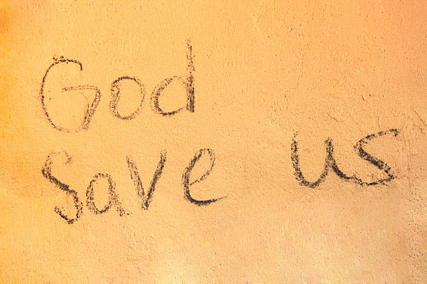 istock God save as inscription on  yellow wall structure in English 468022961