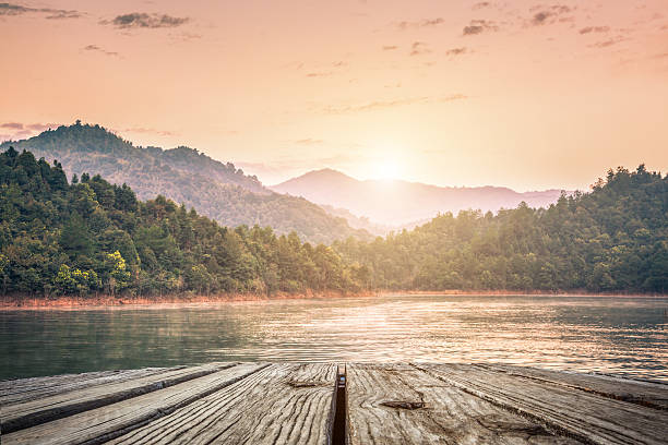 istock Lake in the forest during sunrise 468023103