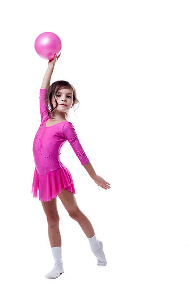istock Emotional little gymnast dancing with ball 468040053