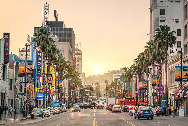 Walk of fame - Hollywood Boulevard in Los Angeles Los Angeles, United States - December 18, 2013: View of Hollywood Boulevard at sunset. In 1958, the Walk of Fame was created on this street as a tribute to artists working in the entertainment industry. historical geopolitical location stock pictures, royalty-free photos & images
