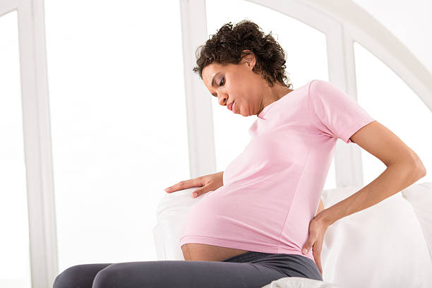 istock Pregnant woman having back pains 468040605