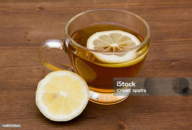 Tea With Lemon On Wood Stock Photo - Download Image Now - 2015, Aromatherapy, Breakfast