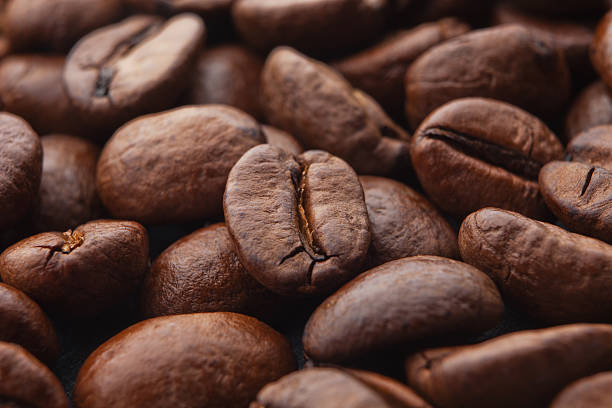 istock Closeup of coffee bean with blur in background 468040870