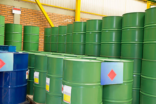 istock Green metal barrels 468040988