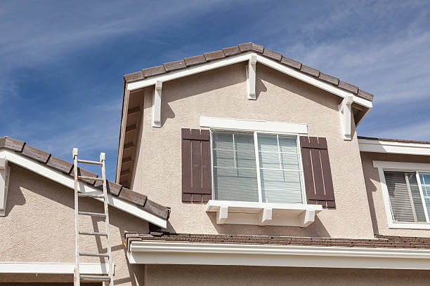 istock Ladder Leaning Up Against A Freshly Painted Home 468041832