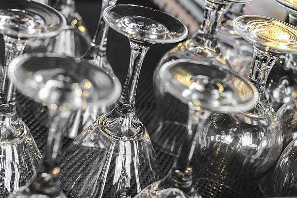 istock crystal wine glasses with blur lights around 468042038