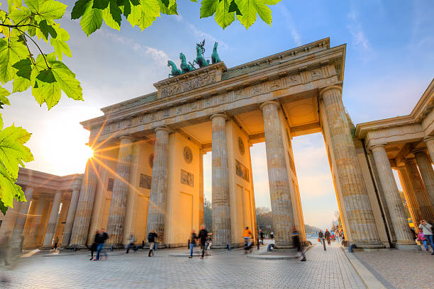 Side view of Brandenburg Gate at sunset Brandenburg gate at summer, Berlin city gate stock pictures, royalty-free photos & images