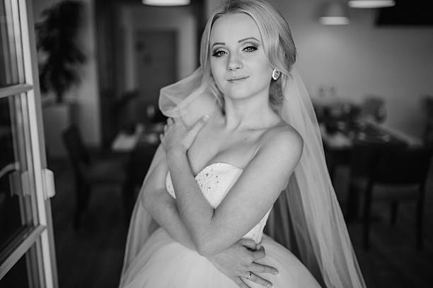 istock blonde bride with her groom 468044292