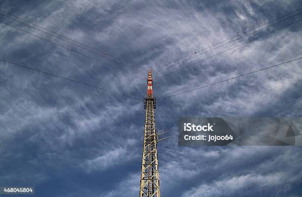 Red And White Radio Tower In Unusual Angle Stock Photo - Download Image Now - Communications Tower, Tower, 2000-2009