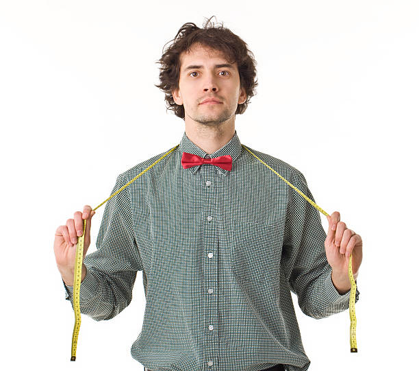 istock Handsome Man Wearing Measuring Tape. 468045816