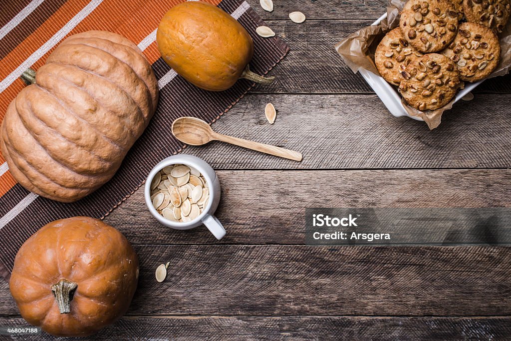 pumpkins and cookies with nuts in Rustic style pumpkins and cookies with nuts in Rustic style . Autumn Season food photo 2015 Stock Photo