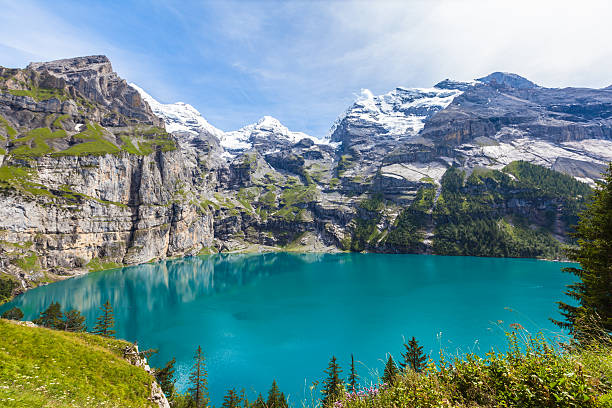 istock Panorama view of Oeschinensee (Oeschinen lake) on bernese oberla 468049066