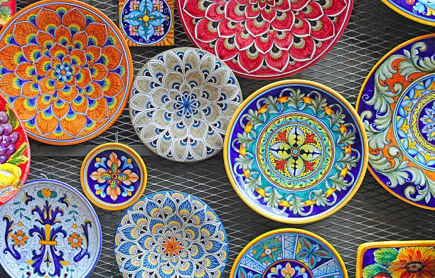 typical colorful ceramic dishes, tuscany, italy