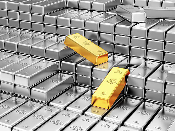 istock Stack of Golden and Silver Bars in the Bank Vault 468050580