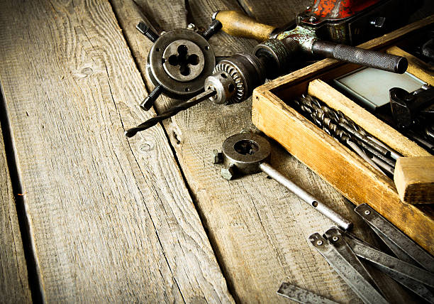 istock Old drill, a box with drills, pliers and ruler on 468059456