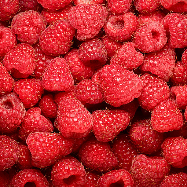 istock background of ripe juicy raspberries 468059904