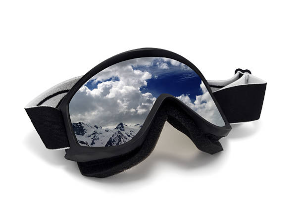 istock Ski goggles with reflection of cloudy mountains 468059950