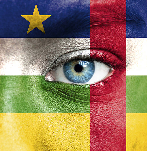 istock Human face painted with flag of Central African Republic 468064285
