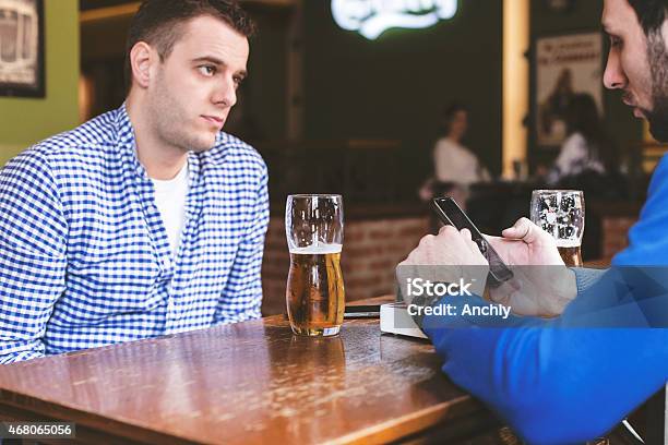 Two Friends Talking Serious Issues Stock Photo - Download Image Now - 2015, Adult, Adults Only