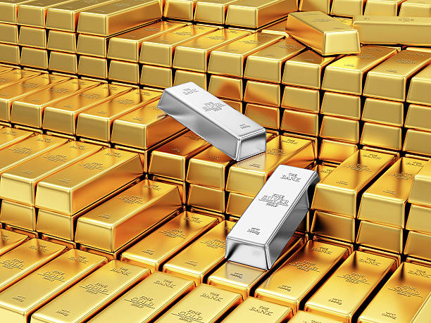 Stack of Golden and Silver Bars in the Bank Vault stock photo