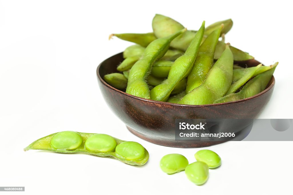 edamame nibbles edamame nibbles, boiled green soy beans 2015 Stock Photo