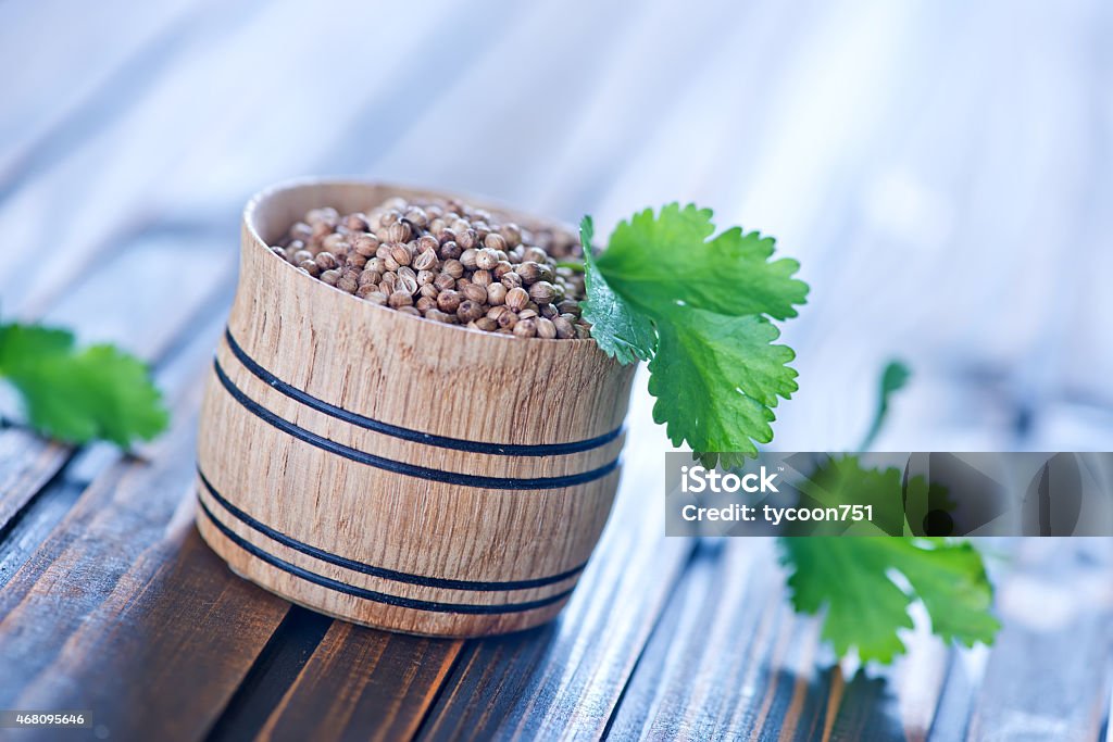 coriander coriander in bowl and on a table 2015 Stock Photo