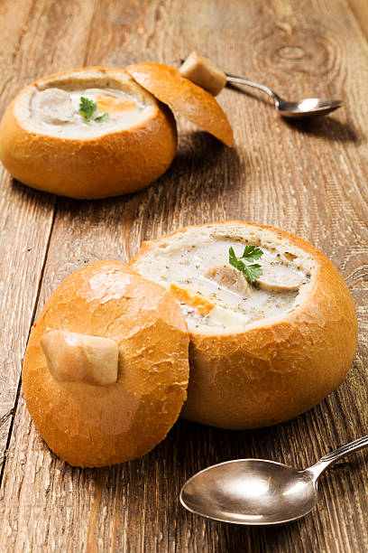 istock Traditional polish white borscht with eggs and sausage in bread 468098652