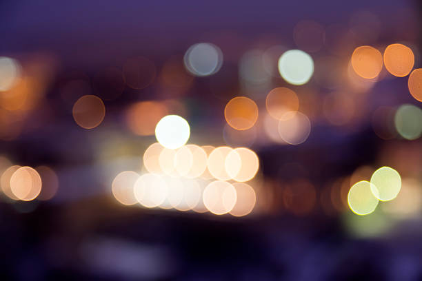 istock Night city street lights bokeh background 468100879