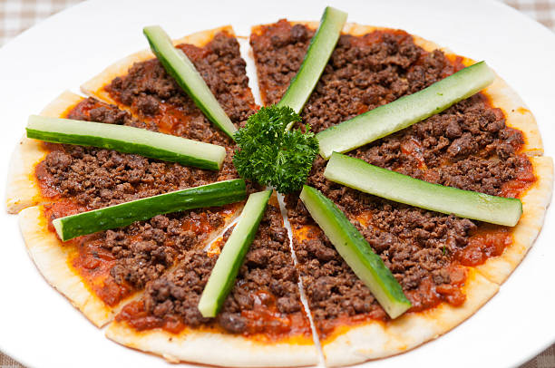 istock Turkish beef pizza with cucumber on top 468102023