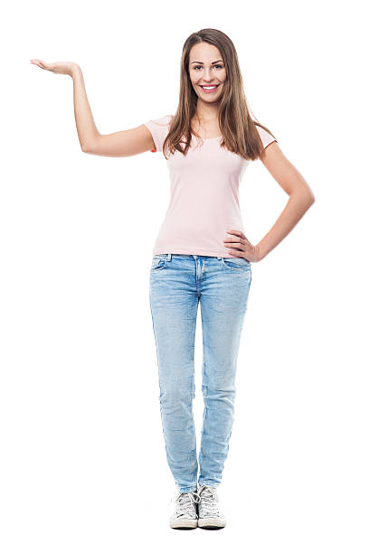istock Young woman showing something 468102115