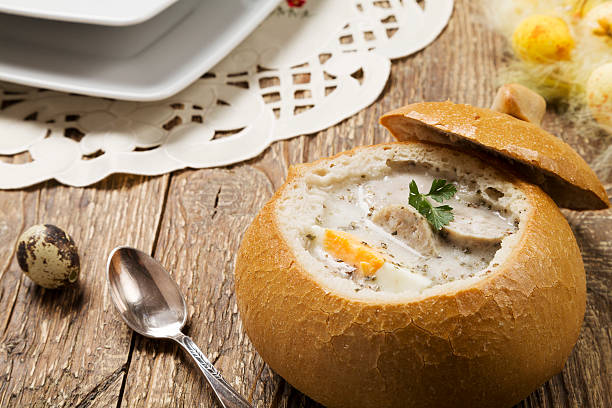 istock Traditional polish white borscht with eggs and sausage in bread 468102652