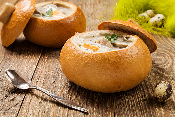 istock Traditional polish white borscht with eggs and sausage in bread 468102662