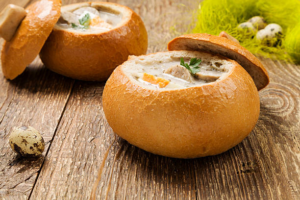 istock Traditional polish white borscht with eggs and sausage in bread 468102666