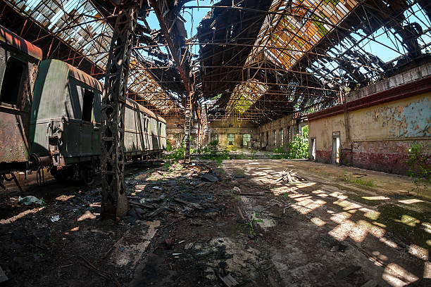 istock Old trains at abandoned train depot 468103572