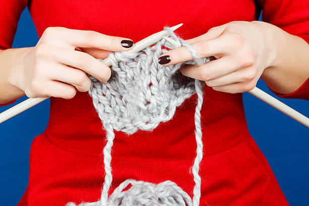istock Knitting of woolen yarn. 468108274