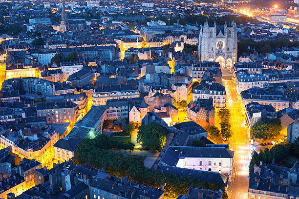 Nantes city at a summer night Aerial view of Nantes at a summer night loire atlantique photos stock pictures, royalty-free photos & images