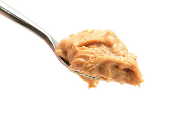 istock Crunchy peanut butter on a spoon 468108682