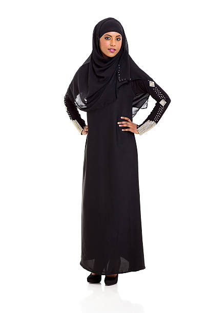 istock young muslim woman standing on white 468109445