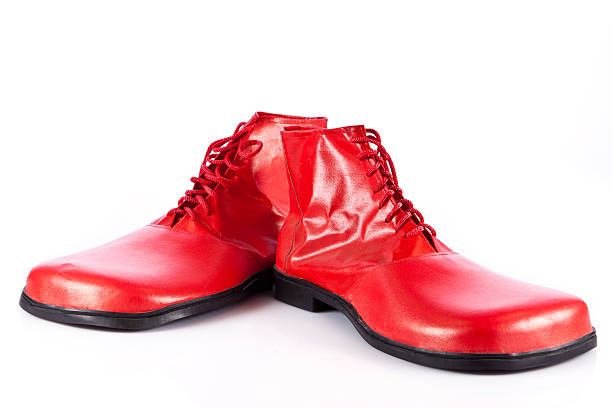 Reserve Arrow Egyptian Very Big Red Clown Shoes On White Stock Photo - Download Image Now - Clown,  Shoe, Adult - iStock