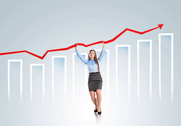 istock Woman with statistics curve 468110661