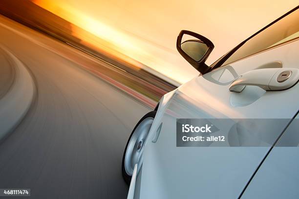 Closeup Of Speeding Car Turing At Corner Stock Photo - Download Image Now - 2015, Activity, Adventure