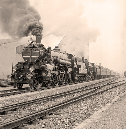 Old-fashioned steam locomotive in an austrian railway station.